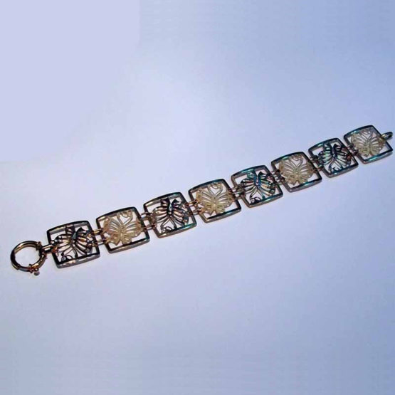 Pulsera de oro amarillo de mariposas caladas