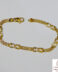 Pulsera de oro amarillo con cadena bismark y 5 detalles