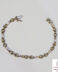 Pulsera de oro blanco estampada semihueca
